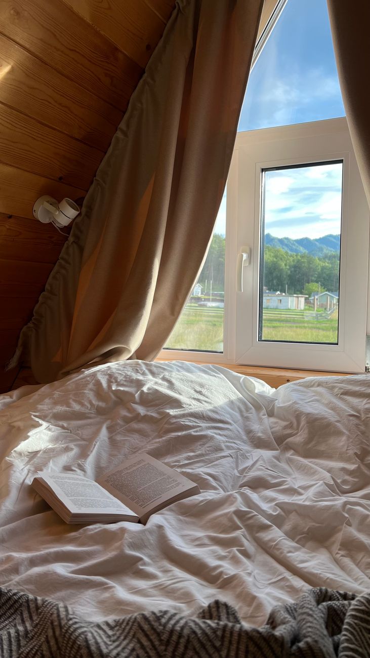 book on bed in house